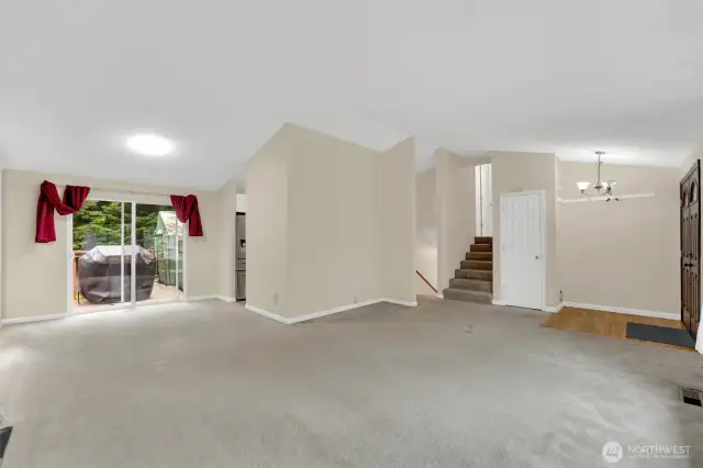 Living room, dining room areas.