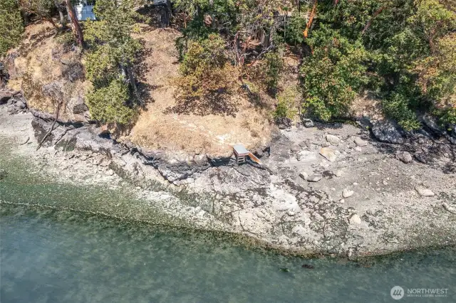 Stairs to the rocky shoreline.