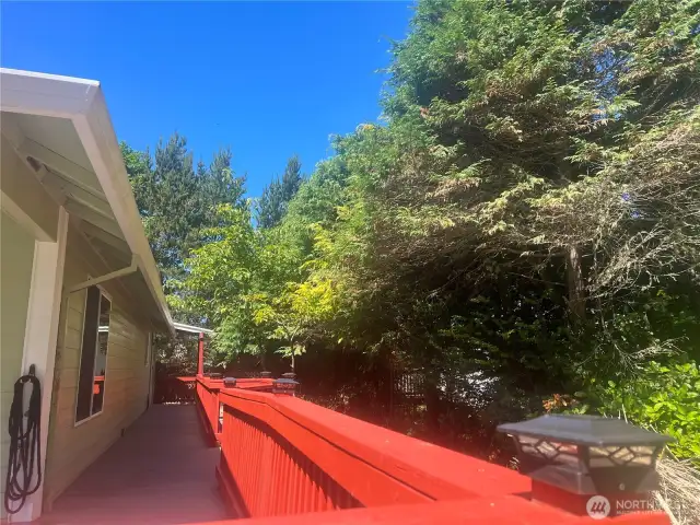 The deck that wraps around has built in solar lighting.