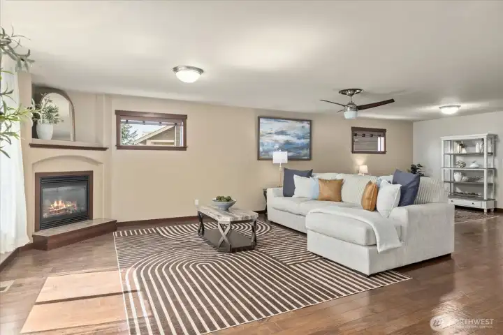 Light, Bright & Huge main living space with gas fireplace.