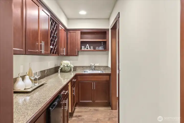 Sink, storage, wine rack & counter space makes hosting friends & family a pleasure!