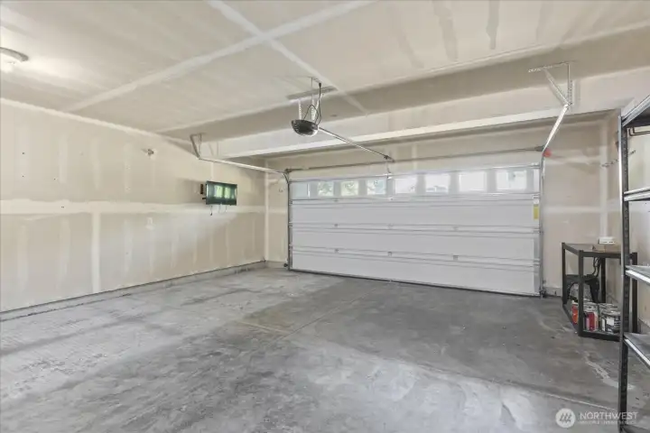 Large Double Car garage with quiet closure.