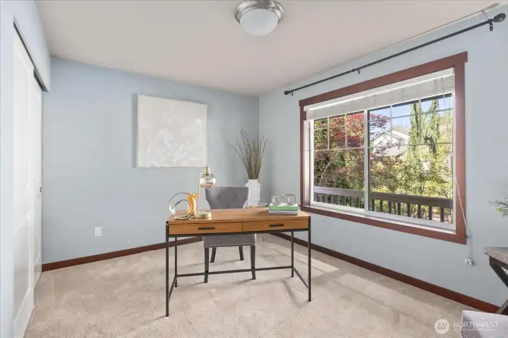 5th Bedroom on lower level works well for home office!