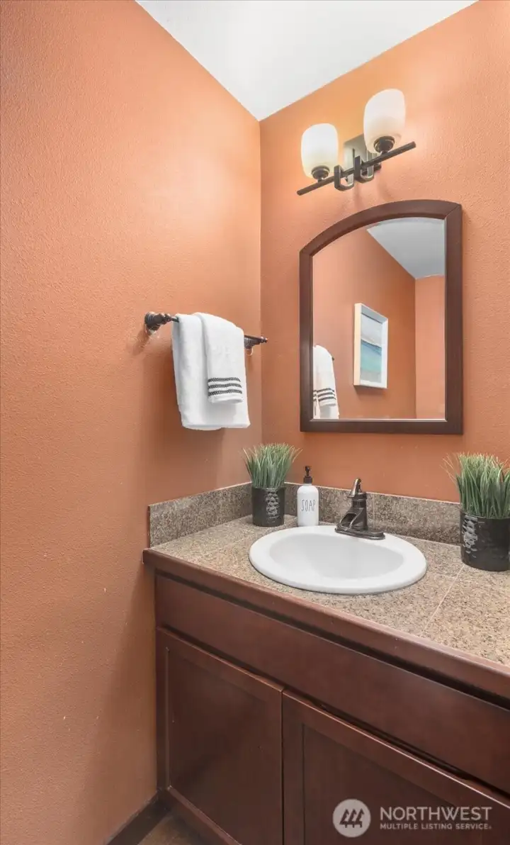 Lower level powder room off the main living space.