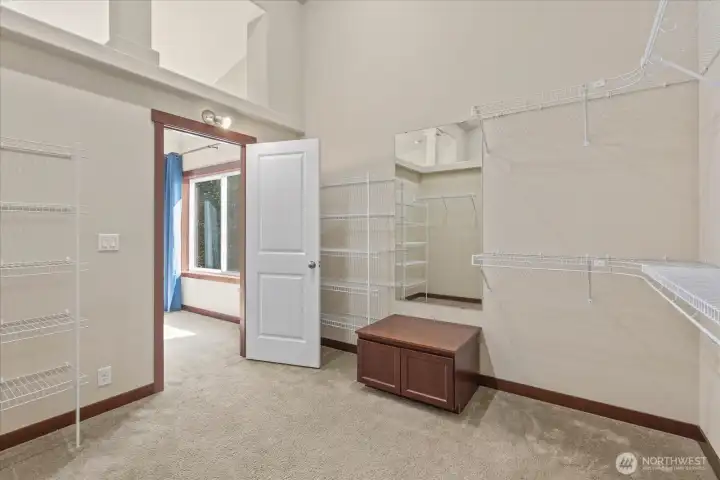 A glimpse of luxury—just one side of the dual-entry walk-in closet off the primary!