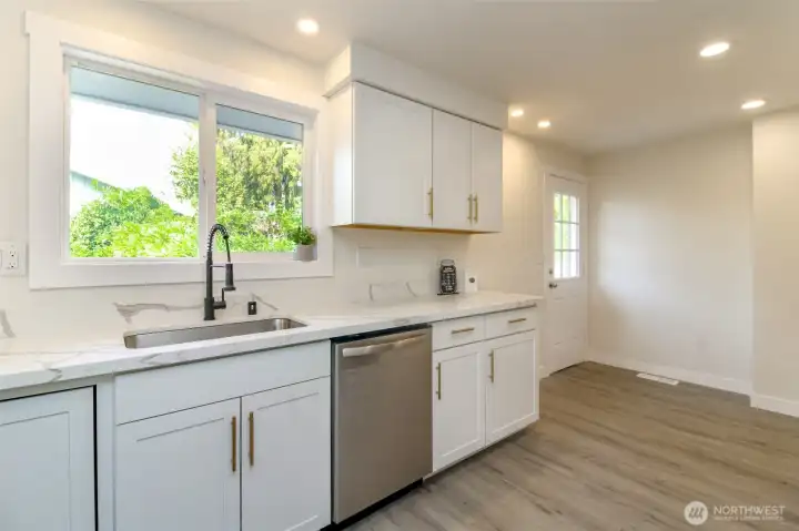 New lighting, new fixtures, new luxury vinyl plank flooring throughout