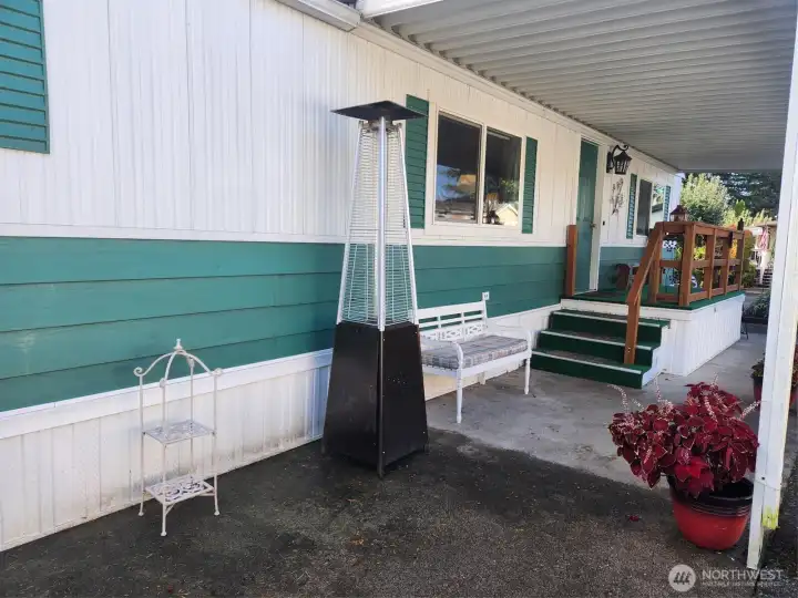 Covered porch area makes for a nice shady place in the summer.