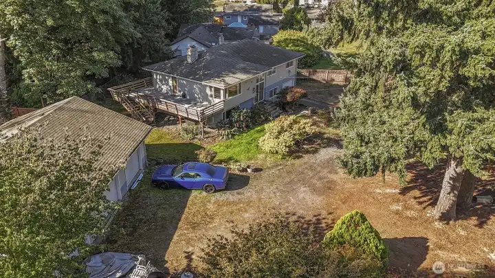 sky view of home and garage