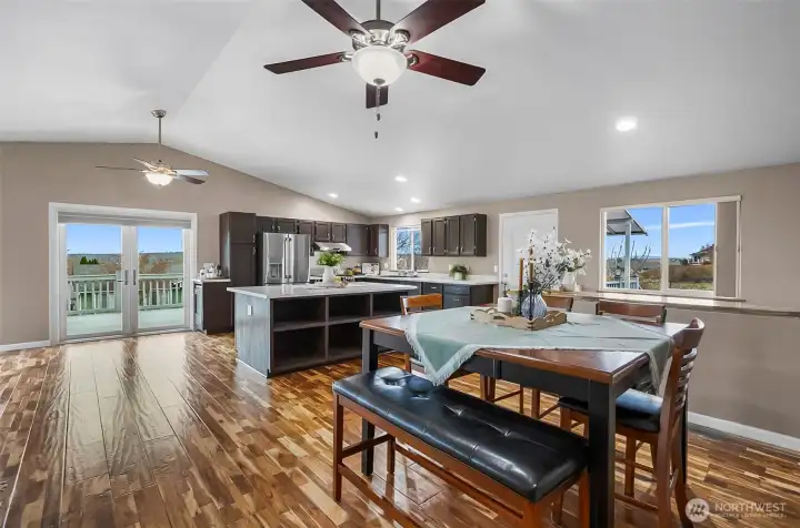 Designed to easily fit a spacious dining table and multiple chairs for gatherings.