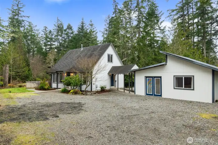 home w covered walk way to fully finished office