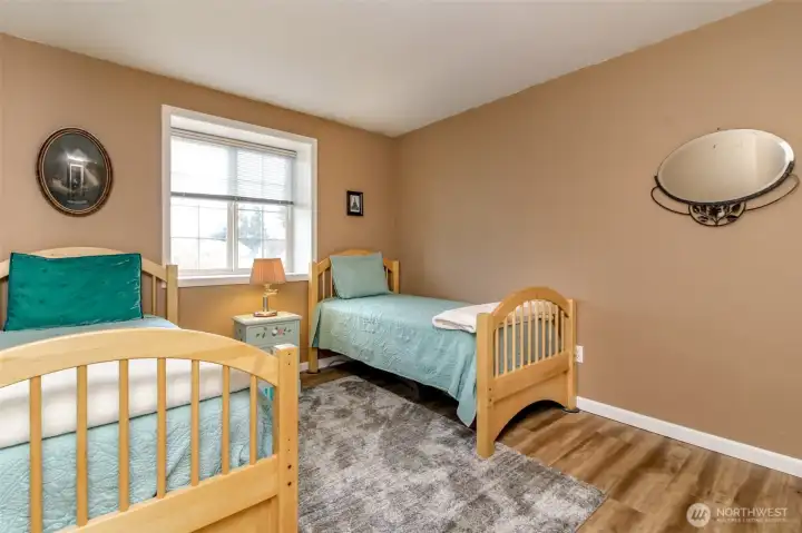 One of the spacious upstairs bedrooms