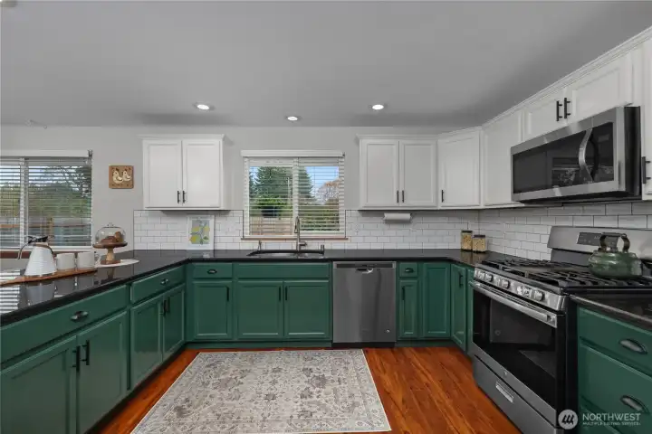 Large kitchen with plenty of cupboards.  Not pictured, under stairwell pantry.