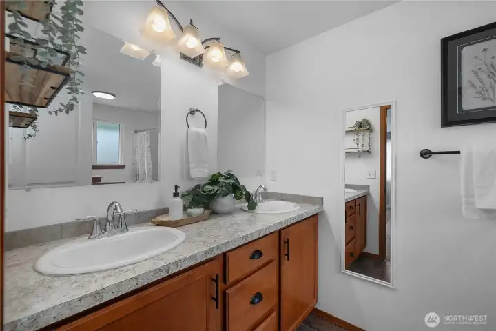 Double sinks in the spacious primary bathroom.