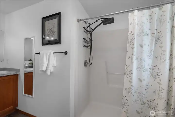 Shower with rain fall shower head.