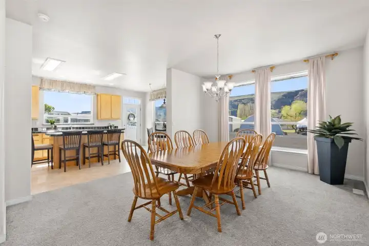 View of dining room looking into kitchen.