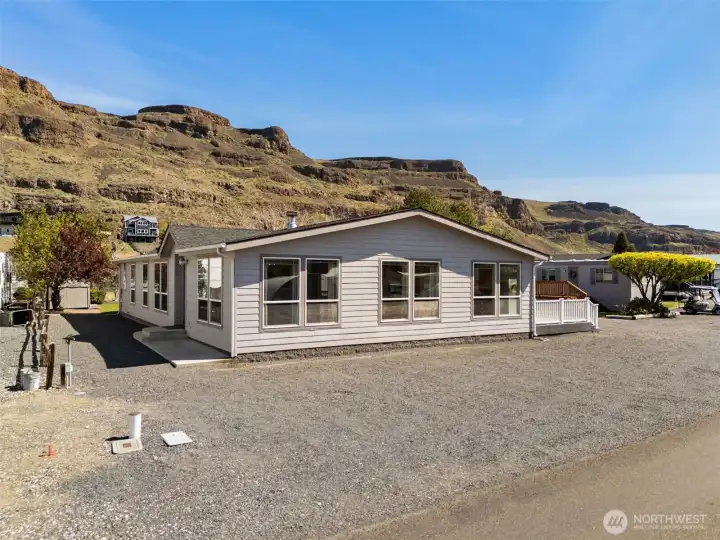 Front of main home with space for RV + hook ups.