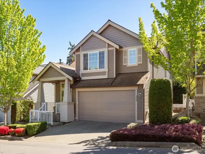 front of home with attached 2-car garage.