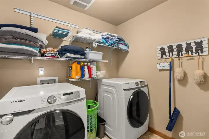 Convenient upstairs laundry with plenty of storage space