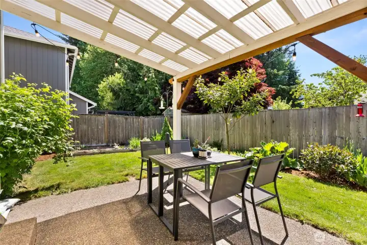 Relax under the covered area with a view of the garden and yard