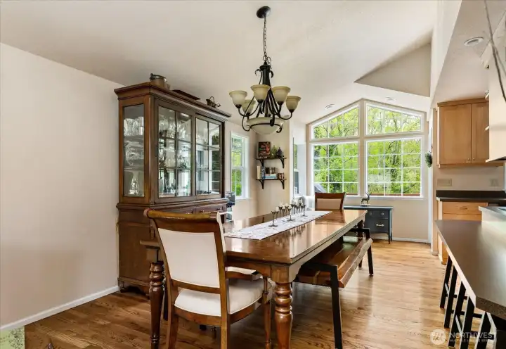 Living area flows seamlessly into a designated dining space.