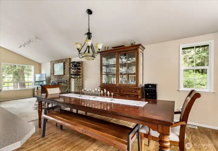 Dining space with a sweet nook and easy kitchen access.