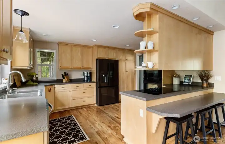 Spacious kitchen with eating area.