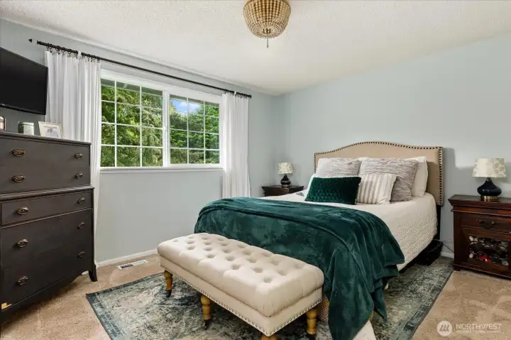 Primary bedroom with en-suite bathroom.