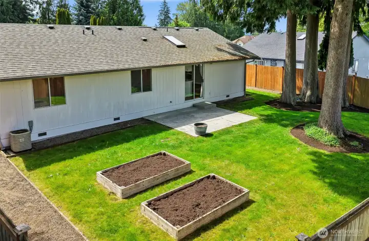Fenced Backyard, with 2 raised beds