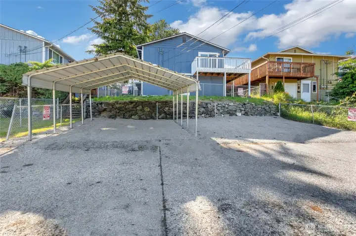 This property has benefited from numerous recent capital improvements including a newer roof, exterior paint, updated windows, exterior doors, new flooring throughout, interior paint, and newer hot water tanks.