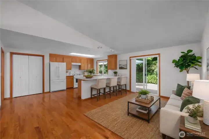 Flexible living spaces easily accommodate your lifestyle, offering room for both casual dining and a comfortable family room. Virtually staged.