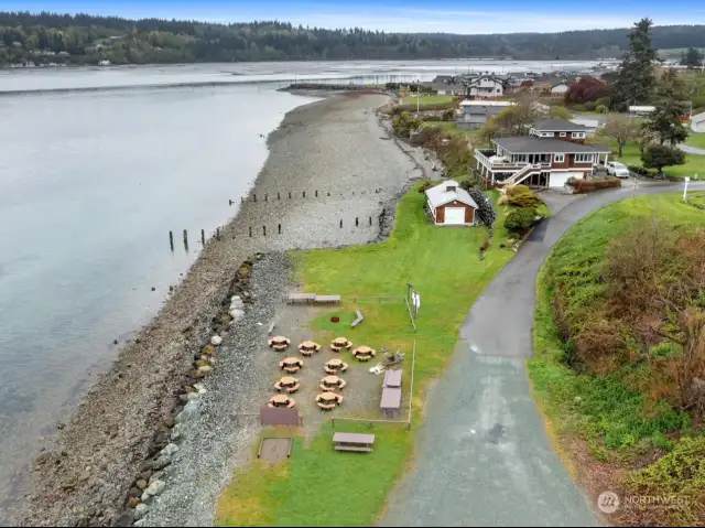 N facing view of community beach, frequent herons sighted at beach.