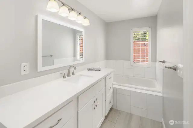 Completely remodeled primary bathroom with soaking tub AND shower