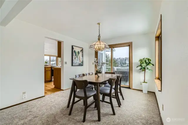 The formal dining room is easily accessible to the kitchen and has separate access to the entertaining deck with extensive territorial views.