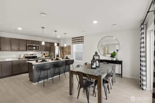 Open Concept living/dinining/kitchen-Interior Pictures: Disclaimer- Photos are of another Lina floor plan from a previous community, photos are for illustrative purposes only. Finishes, flooring, upgrades, or other features may vary.
