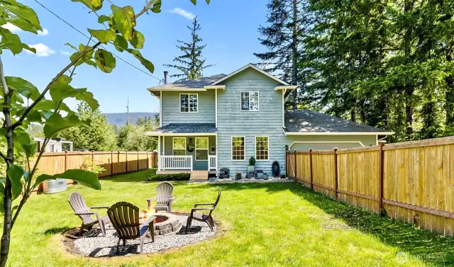 315 Linda Ave fully fenced with firepit, apple, and other fruit trees. Newer fence