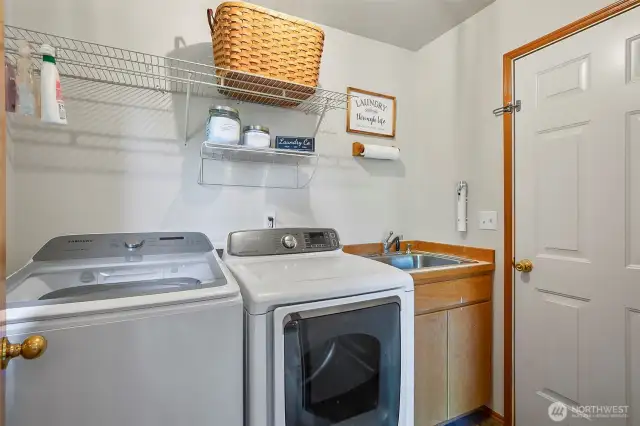 Utility room off of kitchen , entry to 2 car garage