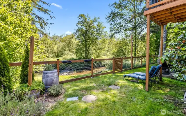 Fenced back yard area, gate to creek. patio and outside furniture to stay if the buyer wants