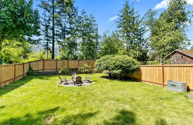 Fenced front yard facing the road. Peek a boo view!