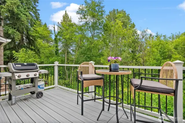 Evening dinners, morning coffee, or entertaining that seamlessly blends into the dining area, kitchen and living room