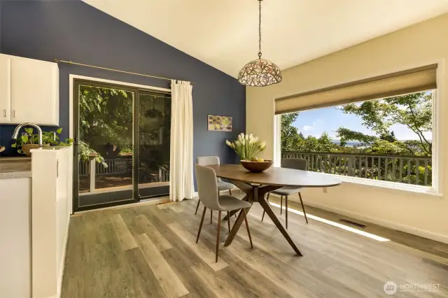 Dining room enjoys views and easy access to the deck and the kitchen.