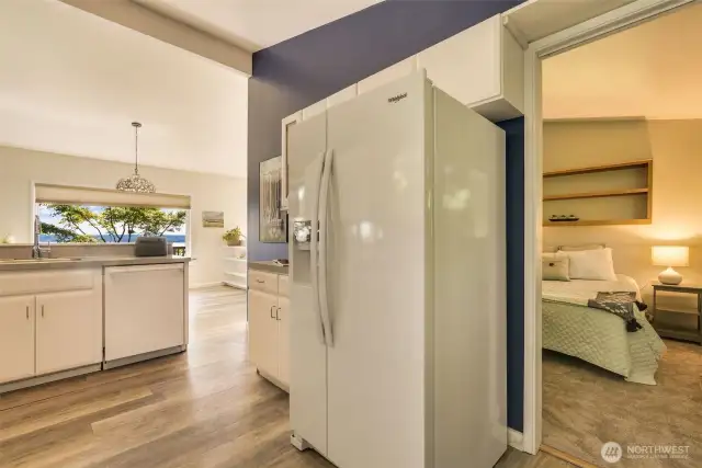 The second bedroom is just off the kitchen or the hall.