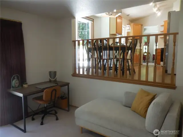 Fam Room Rail to Kitchen Eat in Area.