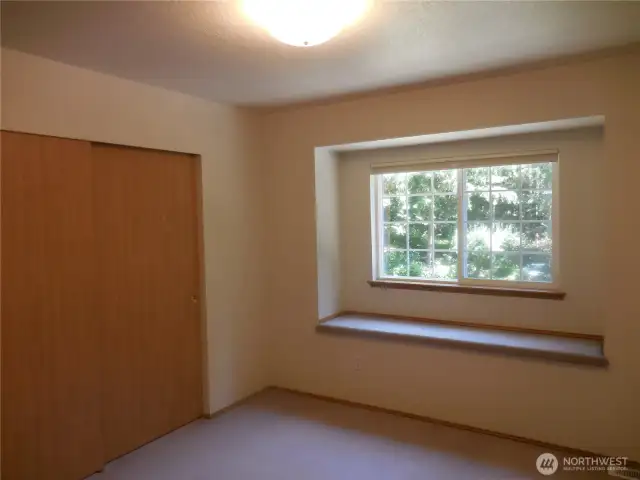 Bedroom # 2 faces South (Driveway Area)