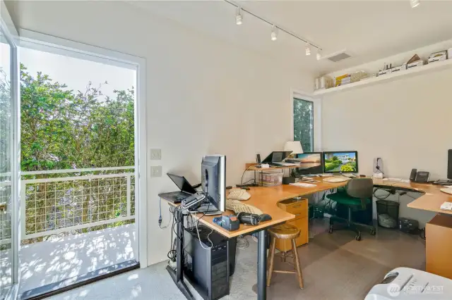 The third bedroom is currently used as an office and also has deck access.