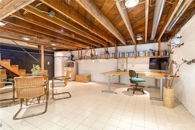 Downstairs is the spacious semi-finished basement. Two windows let in natural light and there's a separate entrance that leads to the garden.