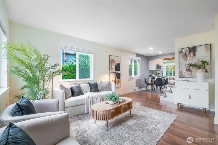 This is good perspective of the main level. To the right there is the hallway to the bedrooms and bathroom, as well as basement access (WATCH your step going down)