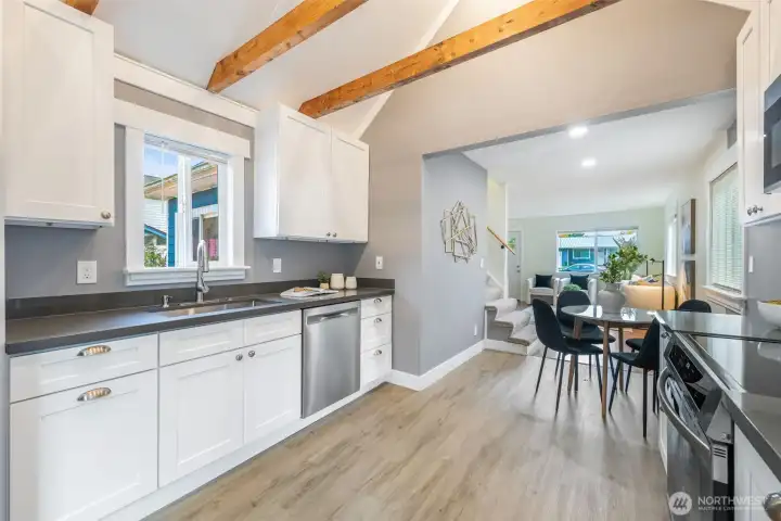New Kitchen with new appliances. Look out the window and admire your new deck.