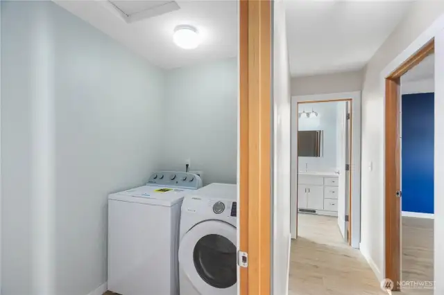 Upstairs laundry, perfect for ease and convenience.