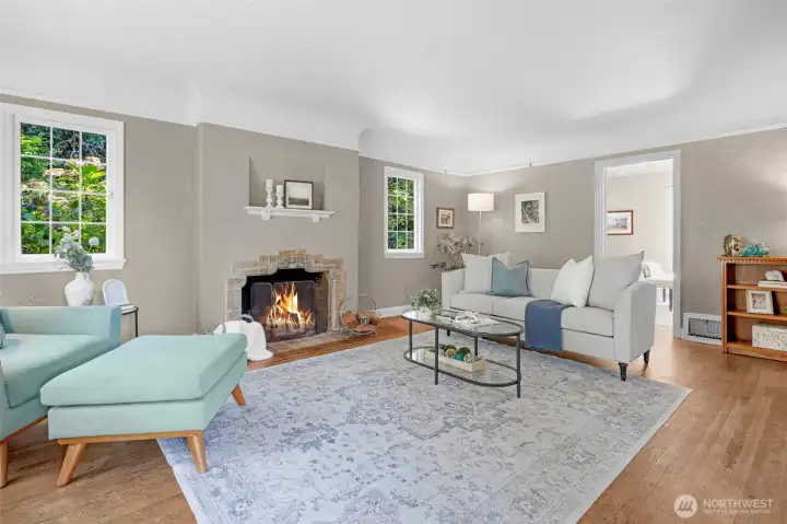The Arts & Crafts fireplace is a focal point for the cozy family room.