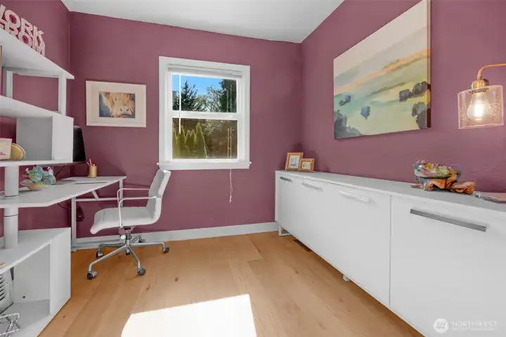A convenient office space is located off the kitchen area.